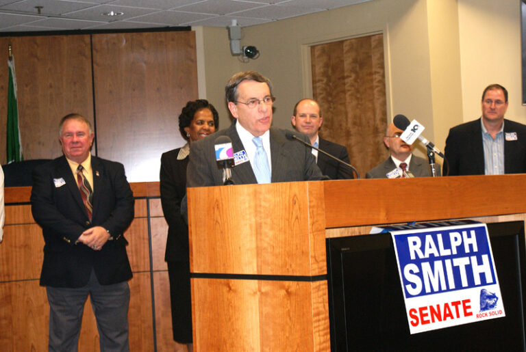 Smith Vows to Return to Senate