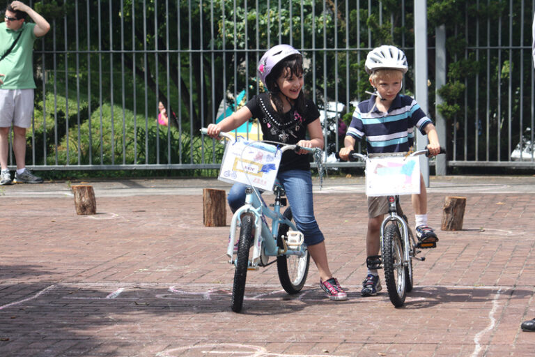 “Kids On Bikes” Race Around Downtown Library Deck