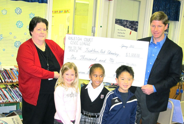 Fishburn Park Librarian Receives Surprise $1,000 Check
