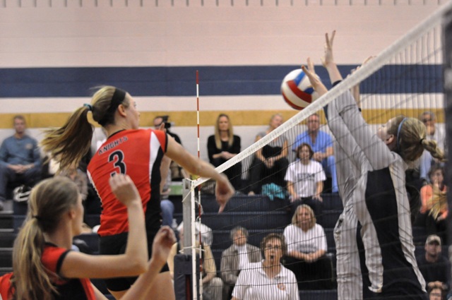 Titans prevail over Knights in Region IV volleyball final